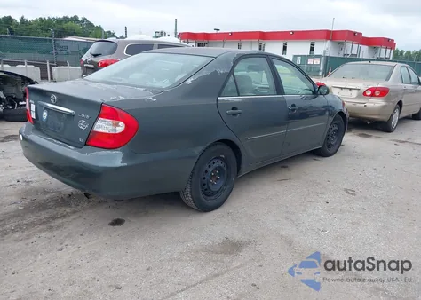 2002 Toyota Camry Xle z USA, uszkodzony, nr VIN 4T1BE30K22U611331